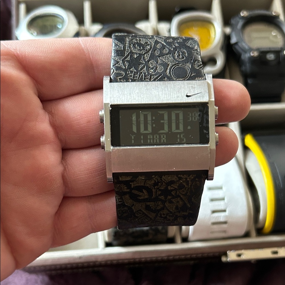 Nike with the leather band perfect watch works good